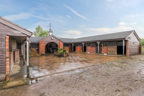 Fed up with the snow? Transport yourself to this cosy cottage, complete with 10 stables - Horse & Hound English Stable Yard, Stable Courtyard, Stable Yard, Stone Porches, Stable Ideas, Horse Facility, Cosy Cottage, Horse Stable, Horse Things