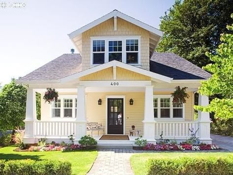 First impressions make a big impression…what does the outside of your home say to potential buyers? #ShorewestRealtors #SellingYourHome #PaintColor House With White Trim, Yellow House Exterior, Bungalow Homes, Yellow House, Exterior Paint Colors For House, Yellow Houses, Craftsman Style Homes, Craftsman Bungalows, House Paint Exterior