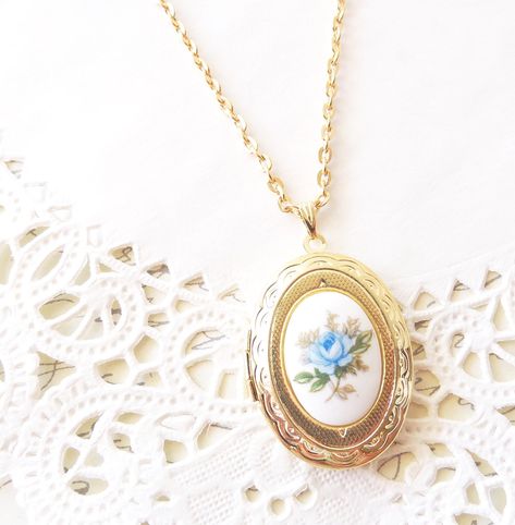 "A gorgeous gold plated photo locket adorned with a lovely vintage blue rose Limoges cameo dangles so pretty from a 16k gold plated link chain with lobster clasp. Total length of chain measures 18\" Blue rose limoges is glass Locket measures 23x30mm Cameo measures 18x13mm Locket is high quality and nickel free Your purchase will come beautifully wrapped ready for gift giving" Rose Locket, Gold Lockets, Rose Gold Locket, Locket Necklace Vintage, Book Pendant, Victorian Locket, Gold Locket Necklace, Oval Locket, Glass Locket