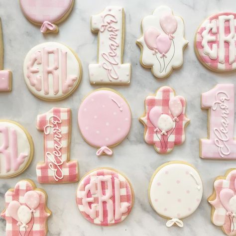 LucyBerry Bake Shop on Instagram: “I love making birthday cookies, but first birthdays are always super fun and special. It’s such an honor to be part of that milestone…” Royal Icing First Birthday Cookies, Itty Bitty Pretty One Birthday, Pink First Birthday Cookies, Pink Bow Cookies, 1st Birthday Cookies Girl, First Birthday Cookies Girl, Pink Birthday Cookies, First Birthday Sugar Cookies, Stenciled Cookies