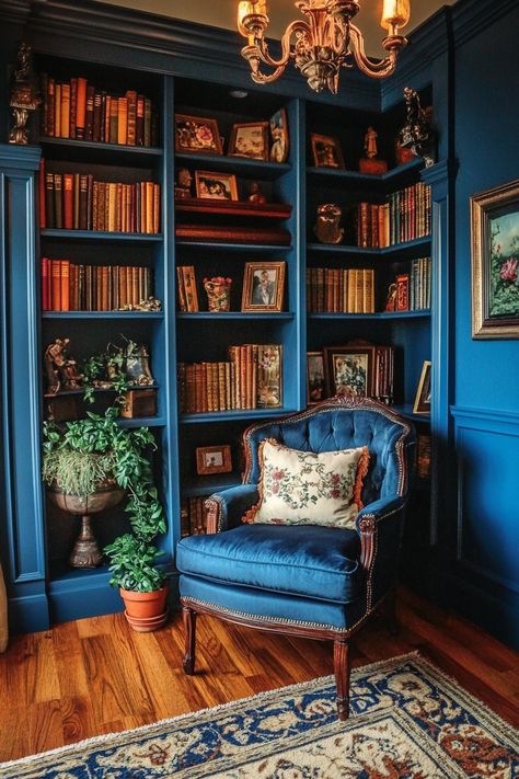 31 Dark Cottagecore House Interiors for a Moody Nostalgic Space Dark Blue Cottagecore, Dark Academia Home Library, Cottagecore House Interior, Whimsical Library, Dark Cottagecore House, Blue Velvet Chair, Blue Library, Dark Academia Home, Cottage House Interior