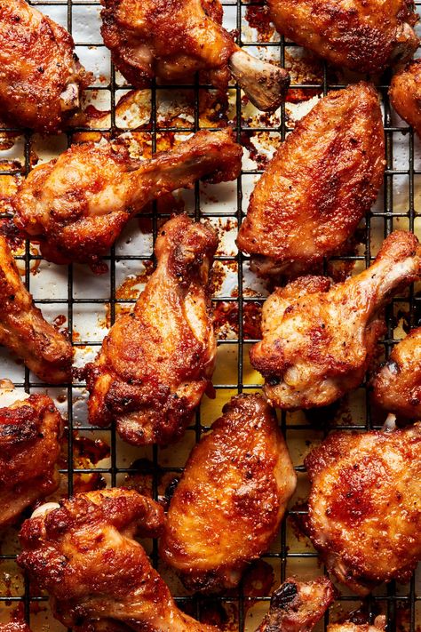 Gently spiced, and perfectly crispy, these baked chicken wings are hard to resist. A quick toss in spices, a brush with butter, and into the oven they go for an easy, hands-off meal. Oven Chicken Wings Crispy, Wings Recipe Oven, Chicken Wings Recipe Oven, Best Baked Chicken Wings, Oven Chicken Wings, Wings Recipe Baked, Easy Chicken Wings, Baked Chicken Wings Oven, Wings In The Oven