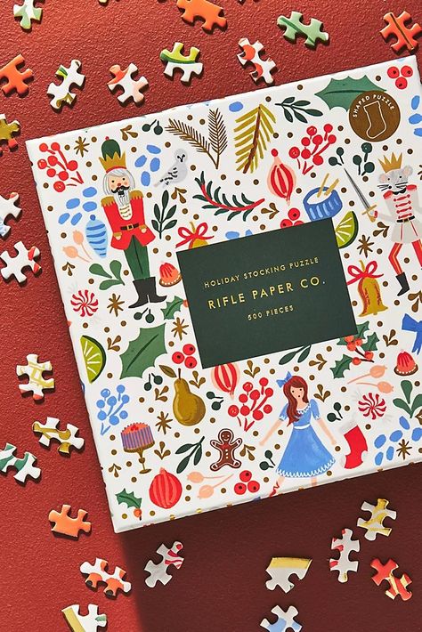 Christmas Ornaments & Holiday Decor | Anthropologie Anthropologie Holiday, Holiday Box, Shape Puzzles, Christmas Packaging, Cardboard Paper, Holiday Stockings, Christmas Games, Christmas Illustration, Christmas Bags