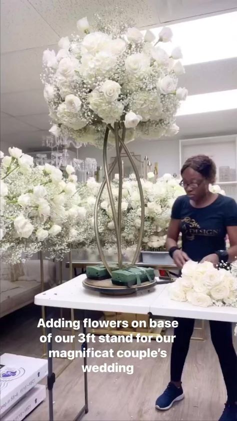 #timelapse of how I add flowers on the base of a 3ft flower stand for one of our magnificat couples..Watch till the end for the reveal on wedding day 🥰..I’ll be posting how I made the huge bridge centerpiece for that wedding in a few days! .#Timelapse #flowertutorial #floraldesigner #weddingdesigner #luxeflorals #luxefloraldesigner #florist #miamiflorist #southfloridafloraldesigner #southfloridaflorist #toturial #floraldesignclass #flowercourse #flowerclass #magnificatfloraldesigncourse #elevat Bridge Centerpiece, Large Floral Centerpieces, Clear Flower Stands Wedding, Gold Wedding Flower Stand, Gold Flower Stands Wedding, Acrylic Stand With Flowers Inside, Flowers Inside Plexiglass Stand, Floral Design Classes, Large Floral Arrangements