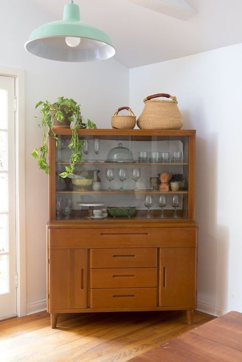 House Tour: A Calm and Comfortable California Cottage | Apartment Therapy Mid Century Modern Hutch, Mid Century Modern China Cabinet, Mr Belvedere, Vaisseliers Vintage, Comfy Cottage, Modern China Cabinet, California Cottage, Redo Cabinets, Mid Century Furnishings