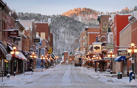 Deadwood, South Dakota.  This adorable historic gaming town is tucked into the Black Hills in a little gulley. You can to go Mt. Moriah Cemetery and see the graves of Calamity Jane and Wild Bill Hickock. Deadwood South Dakota, South Dakota Road Trip, South Dakota Vacation, South Dakota Travel, Travel South, Black Hills, North Dakota, South Dakota, Vacation Spots