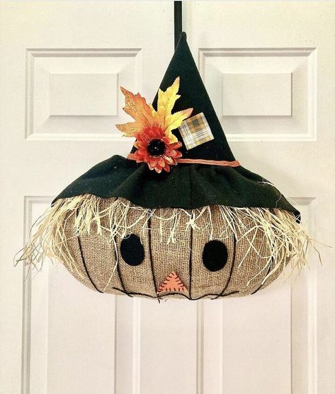 I saw this pumpkin wreath frame at the Dollar Tree, and I remembered that I had a burlap chili sack. So, I figured I would put the chili sack to good use and make a scarecrow face wreath! Materials needed:Pumpkin wreath frameBurlap sackBlack feltOrange feltRaffiaBlack twineFall leavesFall flowerFall ribbonFall materialFoam boardHot glueGlue gun (not shown) Step 1: I cut the burlap sack to fit the pumpkin frame. Step 2: I hot glued the burlap to the frame. I used small clamps to h… Pumpkin Wreath Diy, Fall Dec, Make A Scarecrow, Diy Scarecrow, Scarecrow Face, Scarecrow Crafts, Framed Burlap, Diy Fall Decor, Dollar Tree Pumpkins