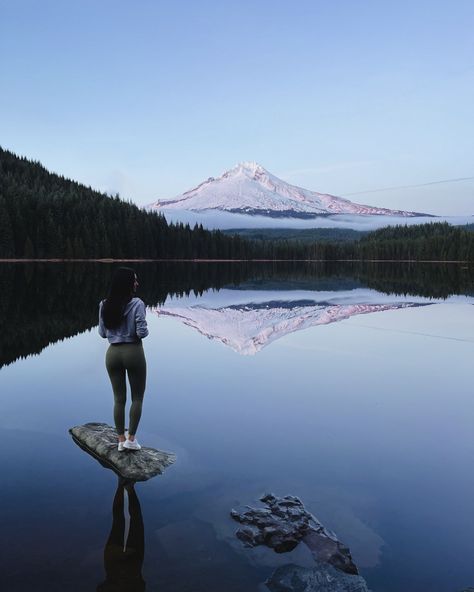 Wander travel girl standing on pnw rock at Trillium Lake enjoying sunset views over Mt Hood in Oregon Pnw Adventures, Oregon Mountains, Washington Mountains, Trillium Lake, Montana Mountains, Oregon Hikes, California Mountains, Oregon Washington, Mt Hood