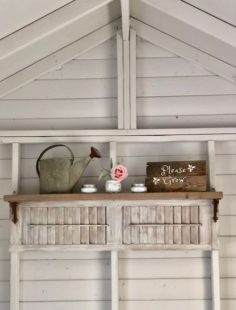 See old shutters repurposed into a great wall shelf.  Come see how!  #oldshutters #shutterproject #shuttershelf Shutters Repurposed Decor, Shutter Shelf, Shutter Projects, Repurposed Kitchen, Indoor Shutters, Raised Panel Shutters, Repurposed Headboard, Shutter Decor, Recycled Decor