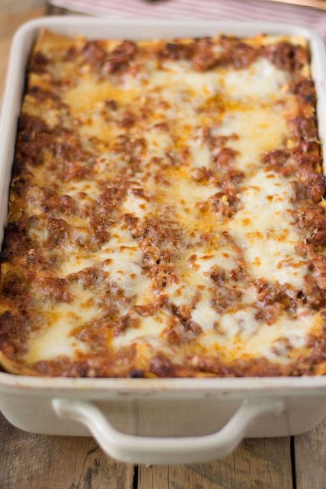 Lasagna (lasagne) Bolognese is a hearty Italian classic recipe with layers of fresh pasta, Bolognese sauce, bechamel sauce and Parmesan cheese. Perfect for feeding a crowd or freezing for future use. #lasagna #lasagne #bolognese Veal Bolognese Recipe, Leftover Bolognese, Beef Lasagna Recipe, Slow Cooker Bolognese, Lasagna Bolognese, How To Make Lasagna, Beef Lasagna, Meat Lasagna, Lasagne Recipes