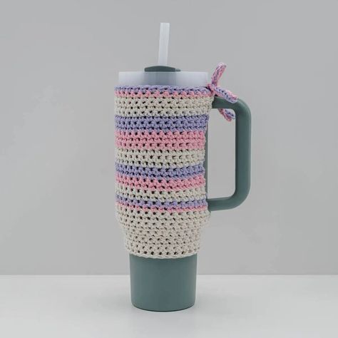 "The super popular Stanley Tumbler is already fantastic, but you can elevate its uniqueness with a personalized crochet cozy, holder, or boot. The Striped Crochet Stanley Quencher Cozy pattern provides a fun way to personalize your Stanley Quencher.  All you need is some leftover cotton yarn and a bit of time to create this charming accessory effortlessly.  Just grab your crochet hook and yarn, and begin giving your Stanley cup a unique flare that’s sure to catch eyes.  " Crochet Stanley Cup Accessories, Crochet Hook And Yarn, Religious Christmas Crafts, Christmas Stockings Sewing, Christmas Crafts Snowman, Kids Christmas Coloring Pages, Sewn Christmas Ornaments, Personalized Crochet, Crochet Christmas Wreath