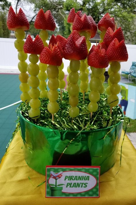 Mario And Luigi Birthday Party Food, Mario Party Dessert Ideas, Super Mario Fruit Ideas, Mario Chocolate Covered Pretzels, Super Mario Appetizers, Mario Bros Snack Ideas, Mario Kart Snacks, Luigi Themed Birthday Party, Mario Theme Treats