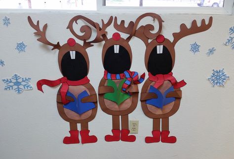 Reindeer winter theme classroom singing reindeer Reindeer Bulletin Boards For Preschool, Singing Reindeer Door Decoration, Reindeer With Christmas Lights, Winter Theme Classroom, Reindeer Bulletin Boards, Snowman Bulletin Board, Hallway Displays, Preschool Bulletin Boards, Reindeer Decorations