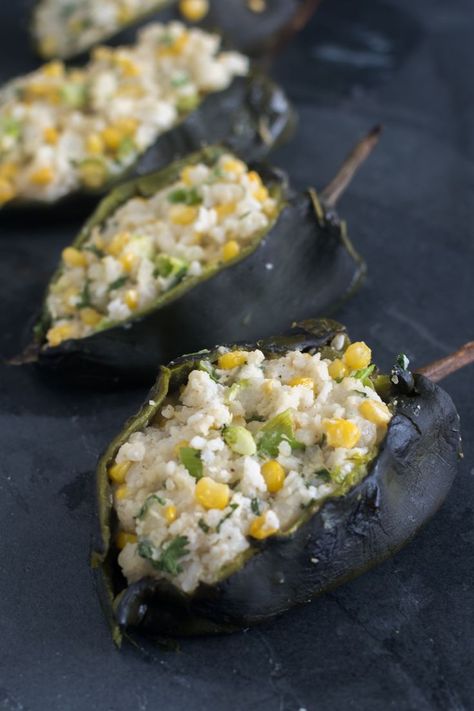 Roasted poblano peppers are stuffed with a creamy, rice filling. I like to serve these with an avocado and tomatillo salsa. Poblano Peppers Recipes, A Spicy Perspective, Poblano Peppers, Stuffed Poblano Peppers, What's For Breakfast, Hash Browns, Peppers Recipes, Breakfast Time, Breakfast Dishes