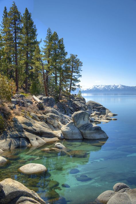 America's Most Beautiful Lake  Where: Lake Tahoe, California and Nevada  Why We Love It: Surrounded by the Sierra Nevada Mountains on all sides, Lake Tahoe's waters are so clear you can see 70 feet deep. Beautiful Places In Usa, Beautiful Places In America, Beautiful Vacation Spots, Montana Vacation, California Camping, Tahoe California, Lake Tahoe California, Places In America, Sierra Nevada Mountains