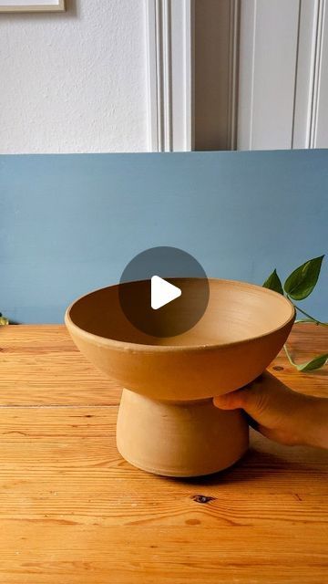 Ceramicsmadebyj on Instagram: "Like all pottery projects, the construction of this pedestal bowl happened over multiple days. Here I am trimming and binding two pieces together that I threw the day before. It's important to work with clay when it is still moist to give the two binding parts a better chance at moulding together, and reducing the risk of cracks appearing. For those playing at home, I used around 2kg of clay for the bowl and 500grams for the base. After this piece has dried out completely, I will be able to work on it again, by adding glaze and firing it in the kiln. Are you curious to see how it turned out?" Pottery Projects, Pedestal Bowl, Pottery Pieces, Working On It, Kiln, Two Pieces, Be Still, Binding, Glaze