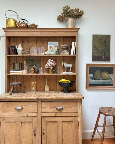 Ciara Kenaston on Instagram: "On my camera roll…
✨my pine hutch, one of my fav Facebook marketplace finds to date!
✨ok these nightstands another fbm find I love!! And that skinny art at thrift store for $4.99!! 
✨ok this is ending up being a fbm post! Love this scalloped potting bench I scored too!! 
✨can you believe I found this @mcgeeandco wallpaper off fbm too!? Plus that cute wicker trunk, I actually bought a pair from a follower on fbm! 
✨and my latest fbm find! My English cottage inspired outdoor iron dining set!!! 

Now tell me, what’s your favorite @facebookmarketplace to date!!!

Share this with who you share your fbm finds with!! 
.
.
.
#cljsquad #howwehome #designsponge #myinspiredhome #interiordesign #hunkerhome #howihome #cottagecharm#myhomestyle #stylingideas #decorideas #neu English Pine Furniture, Pine Hutch, Hutch Styling, Hutch Decor, Wicker Trunk, My Camera Roll, Pine Furniture, Potting Bench, French Kitchen