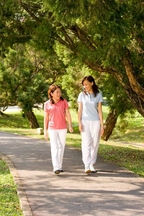 Women Talking To Each Other, Smiling Person, Gentle Exercise, Walking In The Park, Walking Outside, Women Talking, Walking Women, Stock Photos Woman, Women Talk