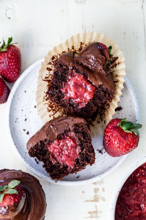 These gluten-free chocolate cupcakes are filled with strawberry chia jam! Make a vegan version with easy substitutions. Recipe by Bakerita. #californiastrawberries #cupcakerecipe #bakingathome #strawberrycupcake #chocolatecupcake #strawberrychocolate #dessertrecipe #cakerecipe #cupcakes #glutenfreedesserts #glutenfreecupcakes #glutenfreerecipes Gluten Free Dairy Free Strawberry Cupcakes, Chocolate Cupcake Strawberry Frosting, Simple Chocolate Ganache, Chocolate Ganache Cake With Strawberries, Dark Chocolate Strawberry Cupcakes, Strawberry Filled Chocolate Cupcakes, Chocolate Strawberry Cupcakes, Chef Inspired Recipes, Gluten Free Chocolate Cupcakes