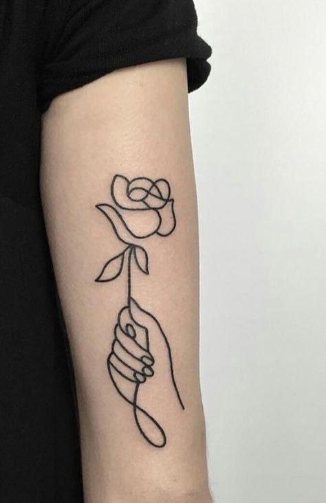 One lined hand holding a rose tattoo | www.otziapp.com Girl Flower Tattoos, Line Drawing Tattoos, Tattoo Quotes For Women, Silhouette Tattoos, Great Tattoos, Hand Holding, Line Tattoos, Rose Tattoos, Finger Tattoos