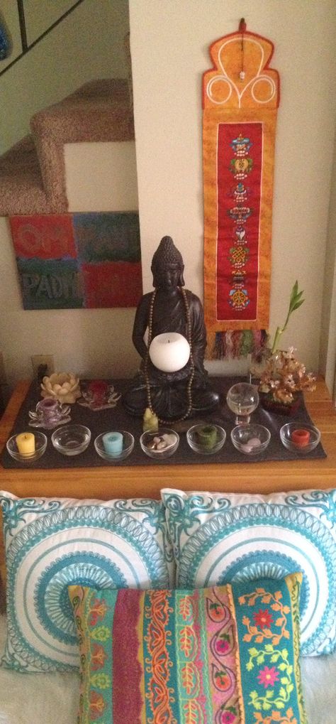 Buddhist home altar with what looks like the same Buddha I found at Target.  I like the Auspicious Symbols wall hanging and glass offering bowls.  I also drape my mala over the Buddha when not it use. Buddhist Altar Home Ideas, Buddhist Home Decor, Buddha Bedroom Ideas, Buddhist Room, Small Meditation Space, Meditation Nook, Meditation Alter, Meditation Place, Meditation Room Design