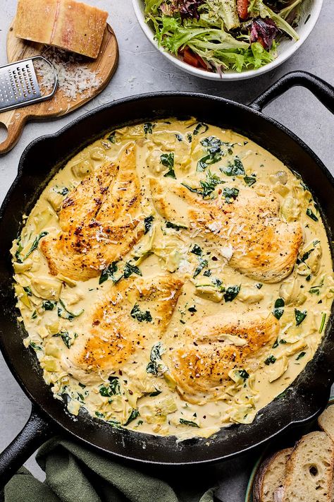 Spinach Artichoke Chicken Creamy Spinach-artichoke Chicken Stew, Chicken Spinach Artichoke Recipes, Creamy Chicken Artichoke Casserole, Recipes With Peas Dinners, Spinach Artichoke Chicken Skillet, Spring Weeknight Dinners, Spinach Artichoke Chicken Stew, Chicken And Artichoke Recipes, Artichoke Chicken Recipes