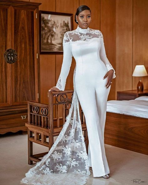 nigerian wedding gallery (@nigerianweddinggallery) posted on Instagram: “We just have to say that bride @steffetb nailed this look! Just look at that. Bride: @steffetb ⁣ Planner: @etaleventsng ⁣ Bridal styling:…” • Sep 10, 2020 at 2:17am UTC Bridal Jumpsuit With Train, Reception Jumpsuit, Jumpsuit With Train, Jumpsuit Wedding Dress, Designer Overalls, White Jumpsuit Wedding, Jumpsuit Wedding, Camo Wedding Dresses, Bride Jumpsuit