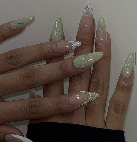 Sage Green Almond Shaped Nails, Sage Green Stiletto Nails, Almond Acrylic Nails Green, Sage Green Nails Almond, Pastel Green Nails Design, Sage Green And White Nails, Pastel Green Nail Art, Linework Nails, Almond Green Nails