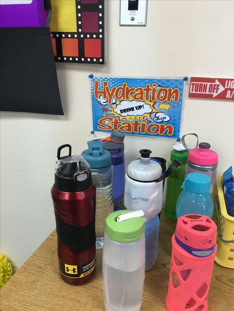 Students leave their water bottles at the hydration station. They can drink water at any one except instruction time during a lesson. Water Bottle Parking Lot Classroom, Classroom Water Bottle Station, Water Bottle Station Classroom, Hydration Station Ideas, Hydration Station Sign, Toddler Water Bottle, 2024 Classroom, Water Bottle Organization, Water Hydration