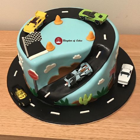 🚗🎂 Rev up your engines for this stunning car-themed road cake! With its realistic road details and adorable car toppers, it's the perfect centerpiece for any car enthusiast's celebration. 🌟🚙 Designed to delight both kids and adults, this cake is not just a treat for the taste buds but a visual feast too. 🍰🏁 Buckle up and join us for a slice of fun on this delicious journey. 🚧🎉  Delivery across Delhi NCR Visit website www.kingdomofcakes.in for more unique designs or call 9999812200 Car Cake Designs For Kids, Car Cakes For Boys, Digger Cake, Car Cakes, Cake Recipes For Kids, Cars Birthday Cake, Cars Cake, Decoration Patisserie, Truck Cakes