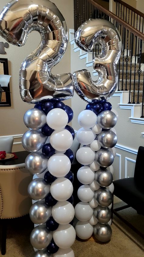 Blue, silver and white balloon columns White Balloon Columns, Sneaker Ball, Graduation Balloons, Balloon Columns, White Balloons, 60th Birthday, Balloon Decorations, Blue And Silver, Balloons