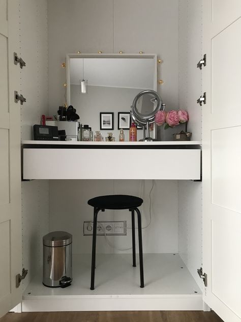 I never liked doing my makeup/ hair in the bathroom, so I decided to go for a table with a mirror in my bedroom. Ikea pax wardrobe was perfect for it, because it’s cheap and aesthetically pleasing. Instead of purchasing a table to put inside of the wardrobe I chose just to put a shelf and a drawer ( that made the table). Used the drawer to put hairdryer, straightener etc. anything with a cable, as I hate the routine of unplugging them and putting them away. Pax Makeup Vanity, Make Up Table In Wardrobe, Vanity In Pax Closet, Ikea Pax With Vanity, Pax Wardrobe Dressing Table, Wardrobe Makeup Table, Makeup Table Inside Wardrobe, Pax Wardrobe With Vanity, Wardrobe With Dressing Table Inside