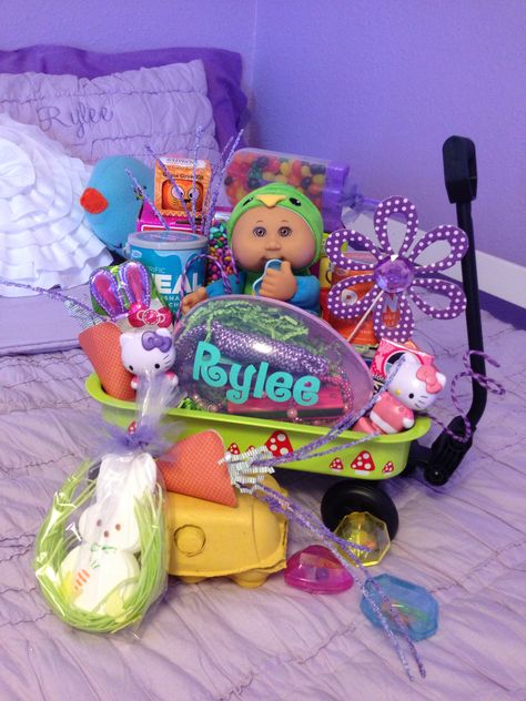 My daughter's non-traditional Easter basket. I found this wagon and thought it'd be perfect for her dolls later on. It all came together and turned out so cute! Traditional Easter, Easter Traditions, Easter Basket, Easter Baskets, Be Perfect, Easter Bunny, Year Old, So Cute, Lunch Box