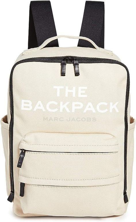 The perfect companion for weekend adventures and long commutes, this utilitarian The Marc Jacobs backpack is crafted from sturdy canvas and features a logo patch and cheeky on-the-nose lettering. #MarcJacobsLove #BackpackObsession #ChicStyle #FashionistaEssentials #BackpackGoals #FashionInspiration #OnTheGoFashion #TrendyAccessories #FashionForward #BackpackAddict Marc Jacob Backpack, Backpack Beige, Laptop Pouch, Find Amazon, Canvas Backpack, Color Collection, Retail Packaging, Women's Style, Patch Logo