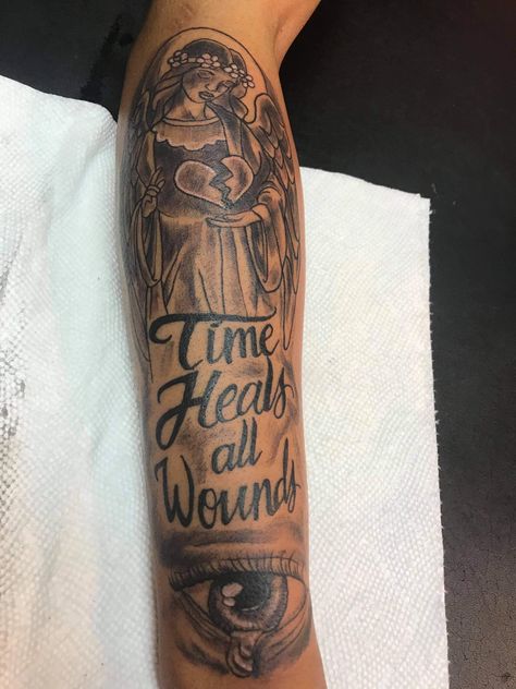 Time Heal All Wound Tattoo, Time Heal All Wounds Tattoo, Rip Mom Tattoo For Men Forearm, God Shoulder Tattoo Men, Time Heals All Wounds Tattoo, Rip Tattoos For Mom, Cute Shoulder Tattoos, Arm Tattoos Black, Tattoo Font For Men