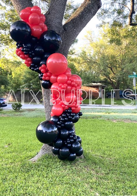 Organic balloon installation in a tree. Red and black balloon. Red and black decor. Outdoors balloon decoration. Black And Red Baloons Decoration, Black And Red Balloon Garland, Outdoor Balloon Decorations, Red And Black Decor, Hibachi Party, Football Balloons, Baby Shower Girl Diy, Balloon Tree, Rose Gold Party Decor