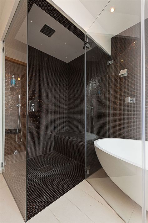 Spacious dark shower with sitting area: love it. Home Depot Tiny House, Makeover Kamar Mandi, Glass Door Bathroom, Walk In Shower Designs, Bad Inspiration, Bathroom Shower Tile, Scandinavian Interior Design, Tiny Houses For Sale, Loft Design