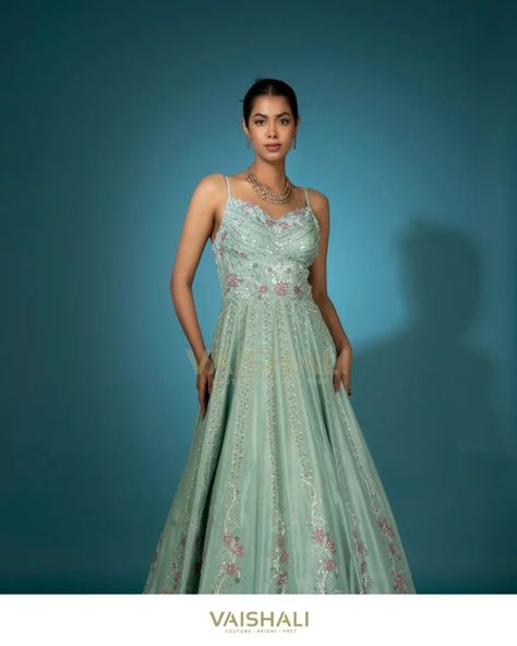 This Sea Green Gown is accentuated with pink applique, cutdana, and sequins, while the hem is intricately finished with scalloped thread work. It features a cutwork V neckline and comes with an embellished detachable cape net jacket. Jewellery by: @shivasajewellery #vaishaliagarwal #inarabyvaishaliagarwal #shivasabysandhyaagarwal #seagreengown #cocktailgown #embellishedgown #fashioninspiration #partydress Sea Green Gown, Pink Applique, Net Jacket, Detachable Cape, Green Gown, Cocktail Gowns, Embellished Gown, Thread Work, Work It