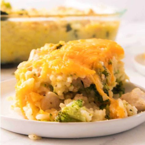 Our copycat Cracker Barrel Broccoli Cheddar Chicken is the perfect warm, cheesy casserole. Tender chicken, broccoli, and cheddar cheese, all baked together in a creamy sauce is sure to warm you up from the inside out. Why You Will Love This Recipe If you've ever had this casserole at Cracker Barrel, than you know how delicious and filling this main entree is. Cracker Barrell Chicken Tenderloin, Broccoli Cheddar Chicken Casserole Cracker Barrel, Cracker Barrel Broccoli Cheddar Chicken, Cracker Barrel Broccoli, Copycat Cracker Barrel Broccoli Cheddar Chicken, Chicken Brocolli Cheddar Bake, Cheddar Broccoli Rice, Copycat Cracker Barrel, Broccoli Cheddar Chicken