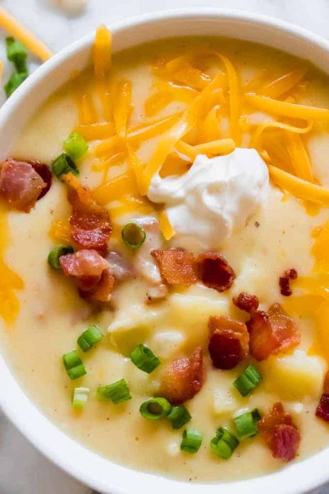 Creamy Potato Soup. This simple potato soup is ultra creamy and comforting! With only a few ingredients this soup comes together quickly on the stovetop. Load it up with all your favorite toppings for the ultimate in comfort food! Simple Potato Soup, The Best Potato Soup, Comfort Food Soup, Best Potato Soup, Cheesy Potato Soup, Potato Soup Easy, Loaded Potato Soup, Creamy Potato Soup, Baked Potato Soup