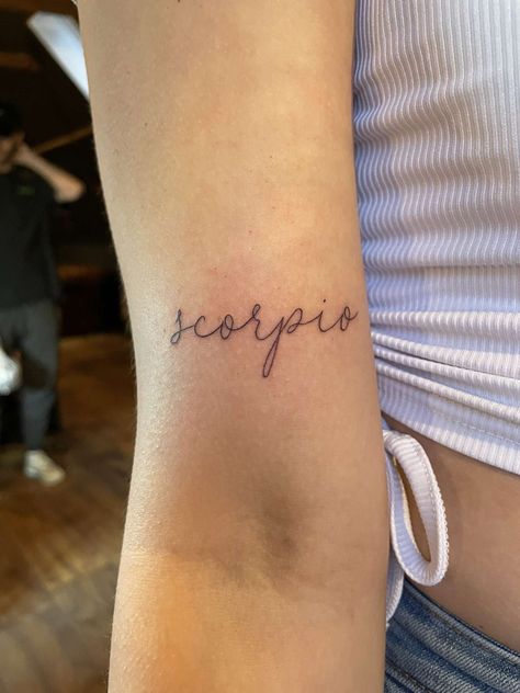 Scorpio Letter Tattoo, Scorpio Tattoo For Women Small, Scorpio Writing Tattoo, Capricorn And Scorpio Tattoo Combined, Scorpio Word Tattoo, Scorpio Wrist Tattoo, Cute Scorpio Tattoo, Horoscope Tattoos Scorpio, Scorpio Zodiac Tattoos For Women