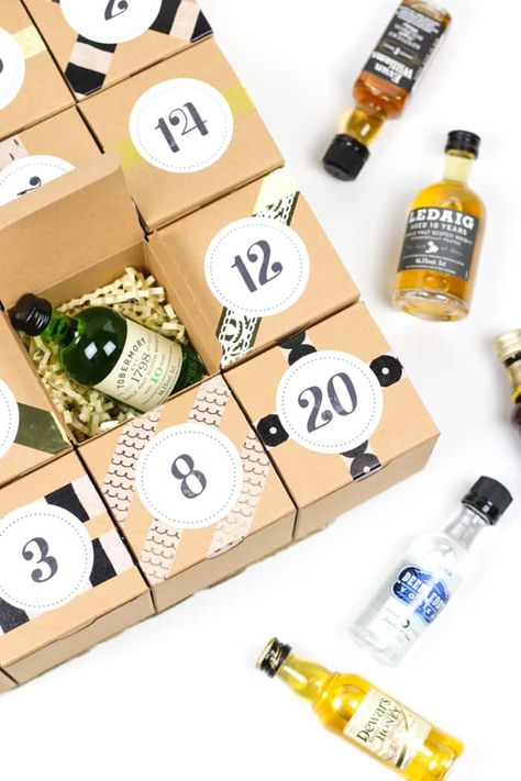 Count down to Christmas with a DIY Booze Advent Calendar! Filled with 25 mini liquor bottles, this project makes the perfect holiday gift for a friend who loves making cocktails. Learn how to make your own, with free printable advent calendar labels! (via feastandwest.com) Booze Advent Calendar Diy, Mini Liquor Bottle Advent Calendar, Alcohol Advent Calendar, Advent Calendar For Men, Adult Advent Calendar, Beer Advent Calendar, Wine Advent Calendar, Mini Alcohol Bottles, Homemade Advent Calendars