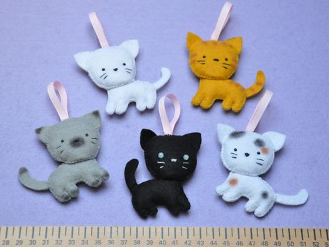 Free Felt Animal Patterns | These ornaments are hand-crafted in felt by me. They're now on sale on ... Felt Cats, Felt Ornaments Patterns, Felt Animal Patterns, Hand Carved Rubber, Rainbow Christmas, Felt Patterns, Christmas Ornament Pattern, Felt Cat, Felt Decorations