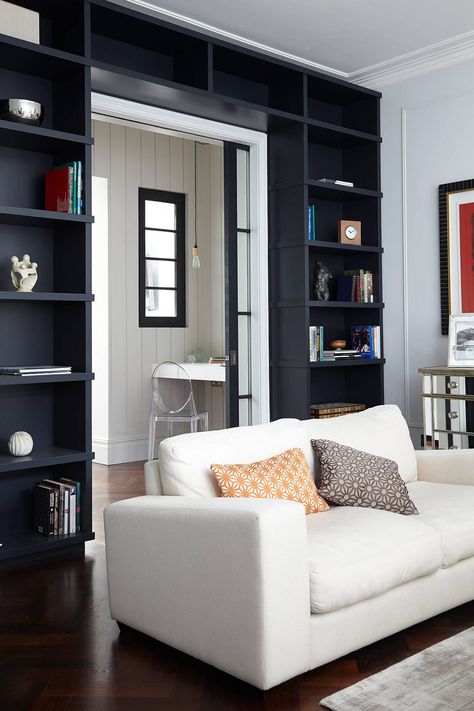 Maximizing Space in Eye-Catching Style #bookshelf #diybookshelf #diyhomedecor #library Shelves Around Doorway, Colorful Eclectic Living Room, Blakes London, Designing Tips, London Living Room, Patterned Cushions, Open Family Room, Industrial Style Kitchen, White Ghost