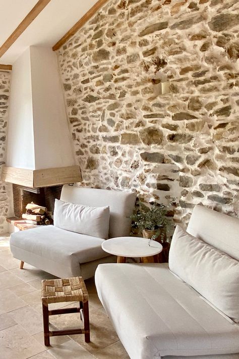 Exposed Stone Basement, Stone House Living Room, Stone Wall In Living Room, Exposed Stone Wall Interior, Old Stone Houses Interior, Stone Feature Wall Living Room, Stone House Interior Design, Stone House Interior, Stone Interior Wall