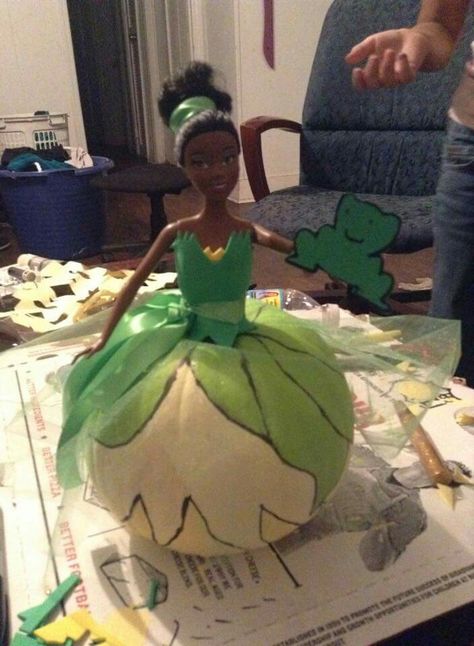 That's a pumpkin, paint and a barbie y'all! Pumpkin project, Princess & the Frog Princess Peach Pumpkin Painting, Princess And The Frog Pumpkin, Tiana Pumpkin, Barbie Pumpkin, Frog Pumpkin, Storybook Pumpkin, Disney Pumpkin Painting, Story Book Pumpkin, Pumpkin Character