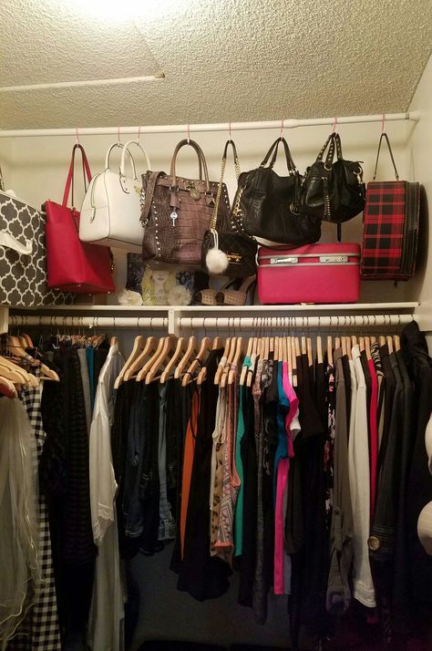 How to dislay handbags in your closet. Organize purses. #organizecloset Closet Hooks For Purses, Organizing Purses In Closet Small Spaces, Organizing Bags And Purses In Closet, Hanging Bags In Closet, Hang Bags In Closet, Hooks In Closet Organization Ideas, How To Organize Bags And Purses, Big Purse Organization, Hanging Purses In Closet