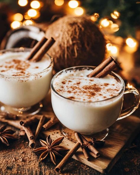 🥥 Coquito 🎄 Creamy Puerto Rican Coconut Eggnog with Warm Spices Ingredients: 1 can (12 oz) evaporated milk 1 can (14 oz) sweetened condensed milk 1 can (13.5 oz) coconut milk 1 can (13.5 oz) cream of coconut 1 teaspoon vanilla extract 1 teaspoon ground cinnamon (plus extra for garnish) 1/4 teaspoon ground nutmeg 1/4 teaspoon ground cloves (optional) 1 to 1 1/2 cups white rum (adjust to taste) Cinnamon sticks (for garnish) Directions: Combine Ingredients: In a blender, combine the evaporat... Coquito Cake, Coconut Eggnog, Cream Of Coconut, White Rum, Ground Nutmeg, Dessert Cupcakes, Evaporated Milk, Sweetened Condensed Milk, Puerto Rican