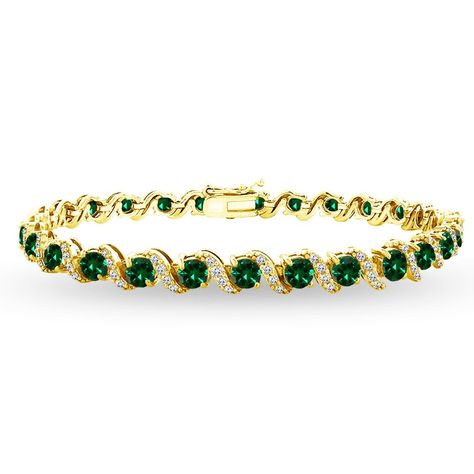 PRICES MAY VARY. FEATURE - This attractive tennis bracelet displays 4mm round prong set simulated emerald stones in between an S design studded with white topaz gemstones. This gemstone bracelet in fine jewelry is a great addition to your emerald jewelry and emerald gemstone jewelry collection; it will enhance your daytime and evening attire. It can be purchased as tennis bracelets for women. CRAFTED - This beautiful bracelet is crafted of 925 sterling silver and is nickel and tarnish free. The Bracelet Displays, Wedding Rings Round, Bracelet Display, Gold Bangles Design, S Design, Emerald Jewelry, Topaz Gemstone, Jewelry Packaging, Tennis Bracelet