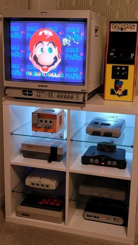 Nintendo Video Games and Retro Consoles Gaming Aesthetic Old Game System Display, Retro Console Display, Retro Game Setup, Vintage Video Game Room, Retro Gaming Console, Game Console Setup, Retro Game Room Ideas, Vintage Gaming Room, Console Gaming Room